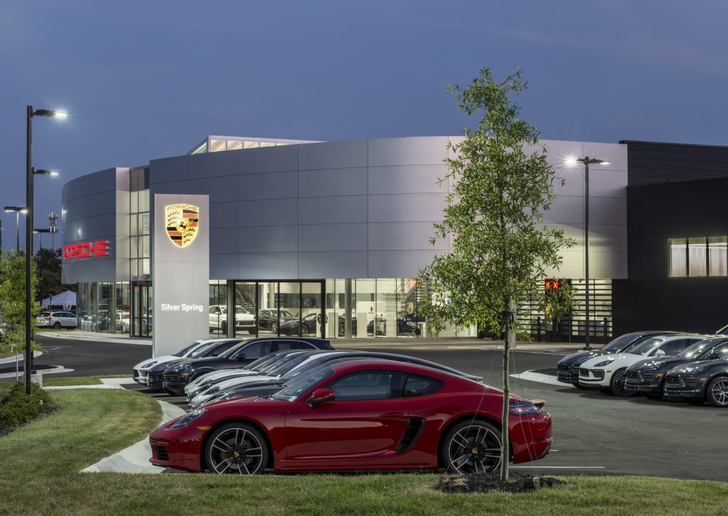 Night time view of the Porsche Silver Spring dealership.